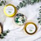 Claimed: Abundance Travel Candle with Green Aventurine, Moss Agate, and Eucalyptus Patchouli Scent for Prosperity and Grounding