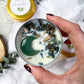 Claimed: Abundance Travel Candle with Green Aventurine, Moss Agate, and Eucalyptus Patchouli Scent for Prosperity and Grounding